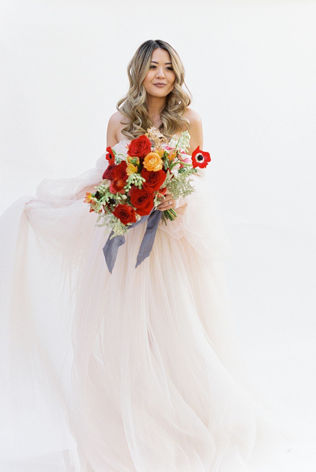 Bride with Poppy Bouquet